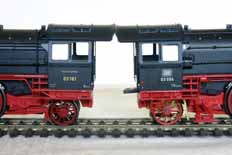 Original and modified trailing trucks on Fleischmann BR03